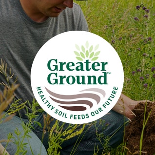 A Farmer Digging in a Field with the Greater Ground: Healthy Soil Feeds Our Future Logo for Web